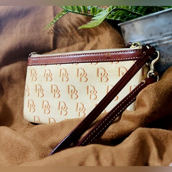Dooney & Bourke Handbags - Dooney & Bourke Beige Monogram Wristlet with Brown Trim